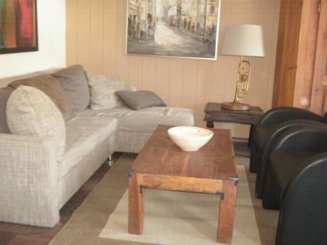 Wohnzimmer mit Schlafsofa 