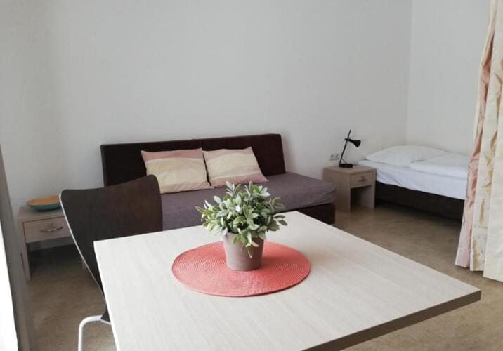 Sitzecke mit Schlafbereich