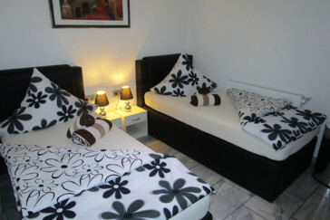 Monteurzimmer in Kirkel - Geräumiges Gästezimmer, Küchennutzung, Gemeinschaftsbad