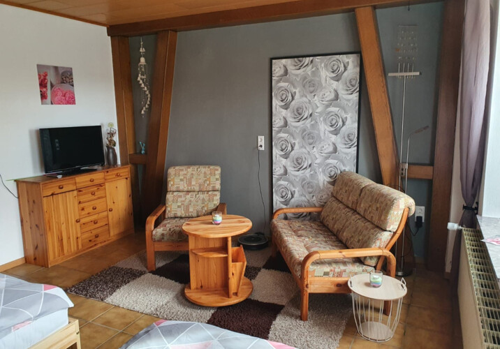 Zimmer 1 Sitzecke Wohnung unte