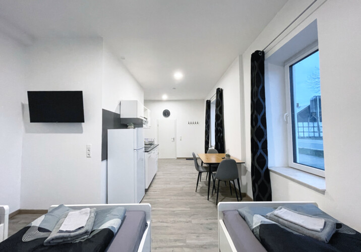 3-Bett Zimmer mit eigenem Bad.