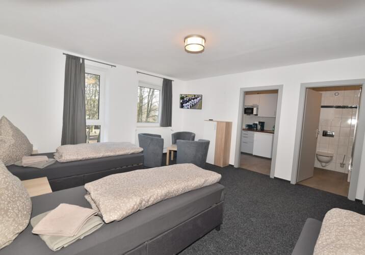 Drei Bett Zimmer