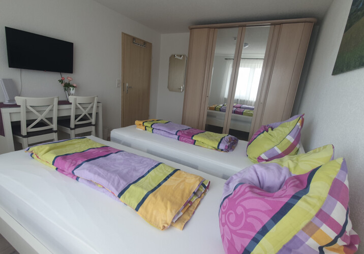 Schlafzimmer mit 2 Einzelbett