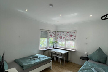 Schlafzimmer mit zwei Betten