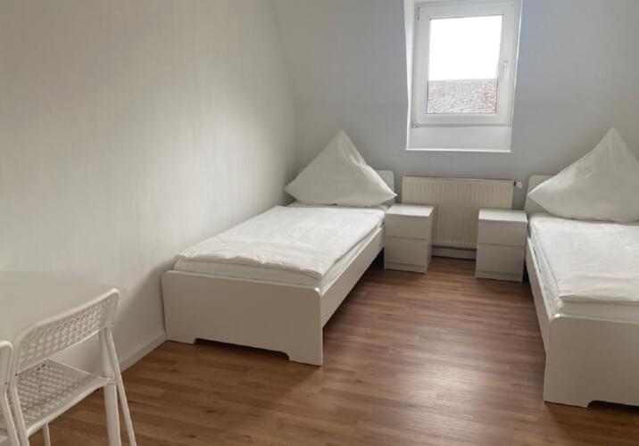 Schlafzimmer mit zwei Betten