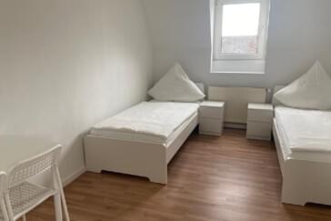 Schlafzimmer mit zwei Betten