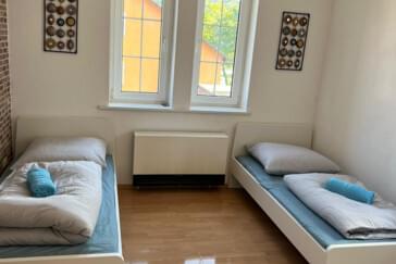 2 Einzelbetten je Zimmer