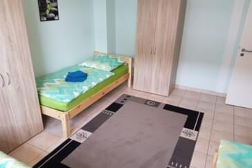 Schlafzimmer 1 von 2 / 6 Pers