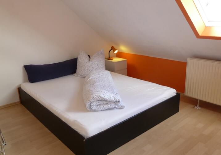 Zimmer im Dachgeschoss links 