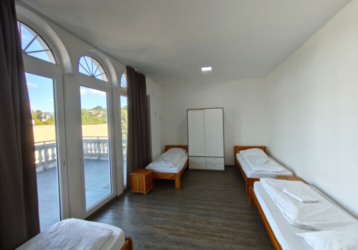 Schlafzimmer 1 Pension B