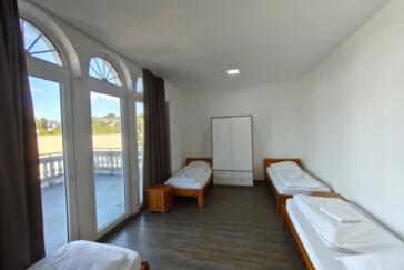 Schlafzimmer 1 Pension B
