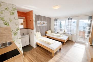 DZ mit eigener Dusche u. Küche